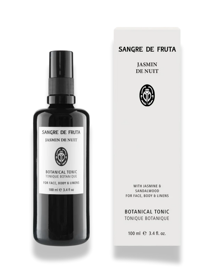 Black bottle and white box of Sangre de Fruta Jasmin de Nuit botanical tonic on a white background
