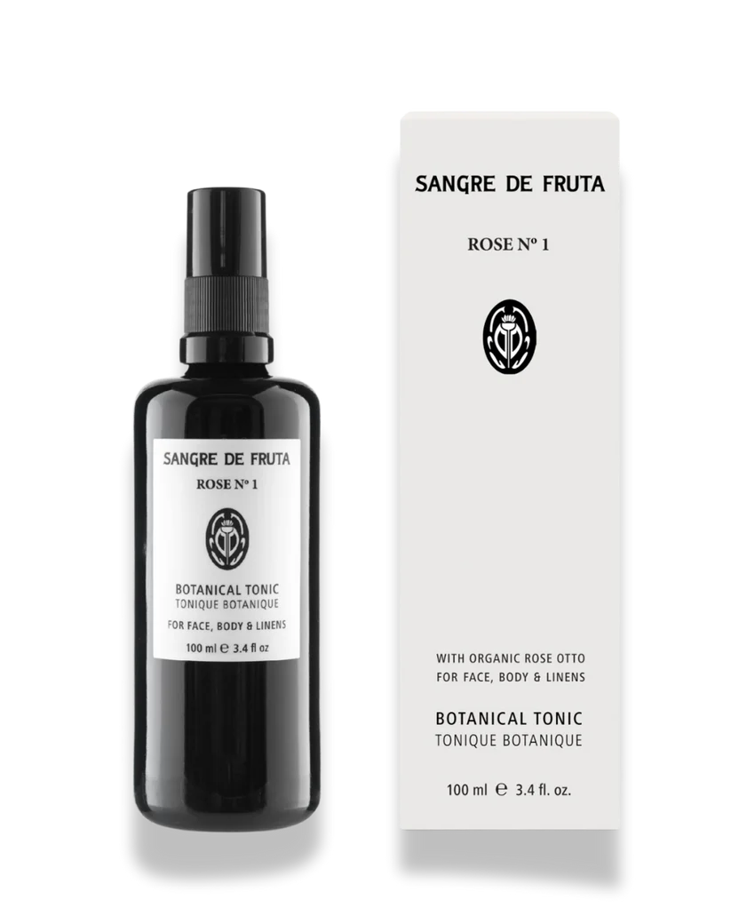 Sangre de Fruta botanical tonic bottle and packaging on a white background