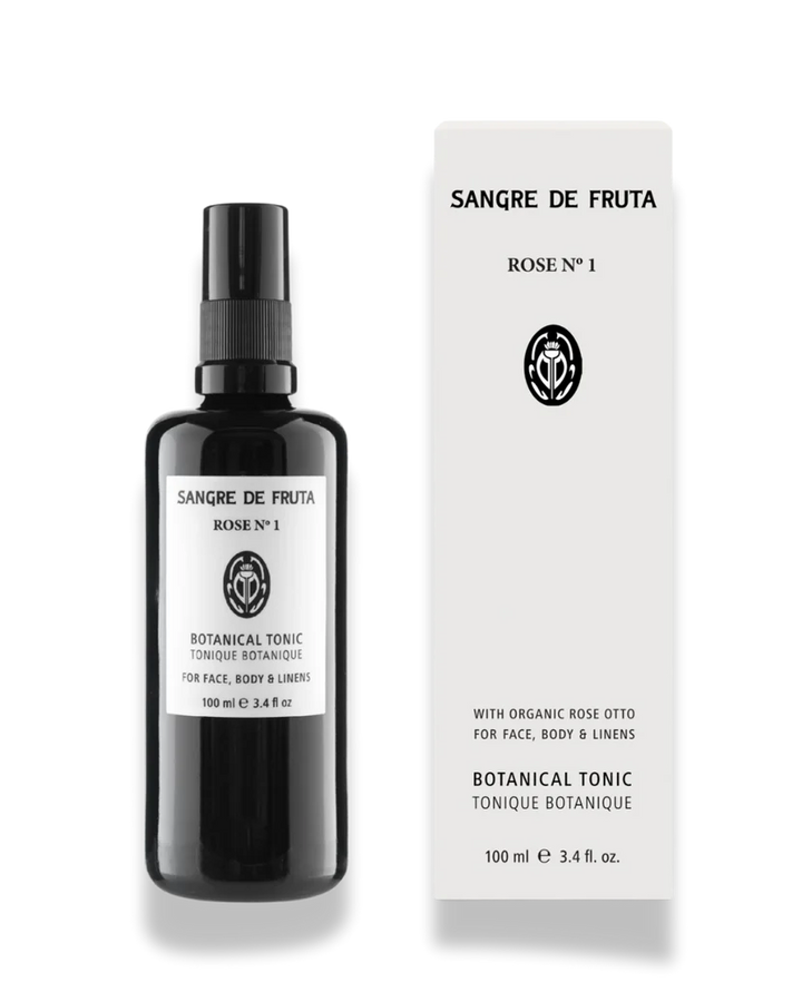 Sangre de Fruta botanical tonic bottle and packaging on a white background
