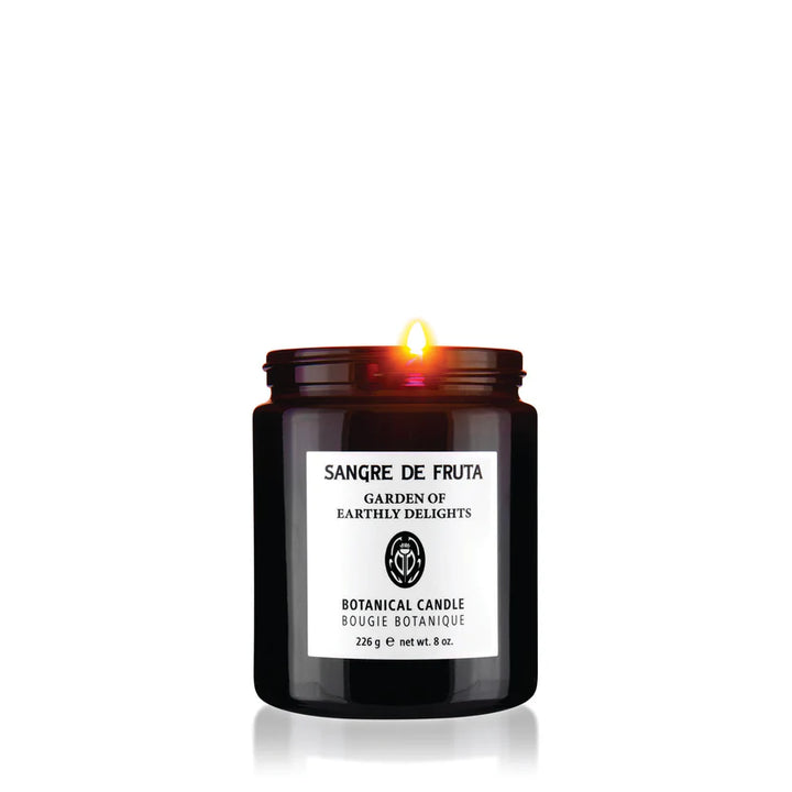 Botanical candle with a label on a white background