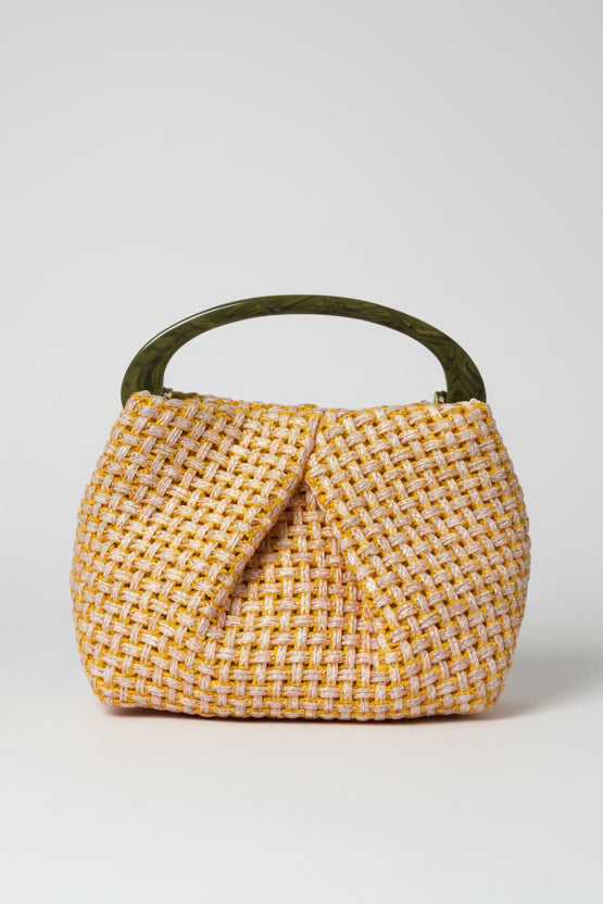 Yellow woven handbag with a green handle on a white background