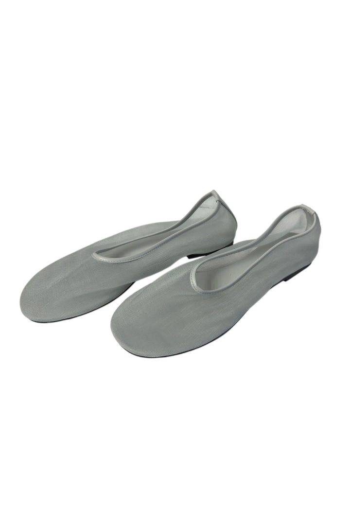 Pair of gray rubber shoes on a white background