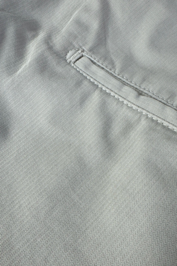 Close-up of gray fabric with stitching detail