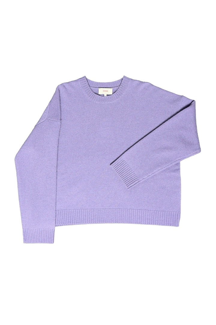 Lavender sweater on a white background