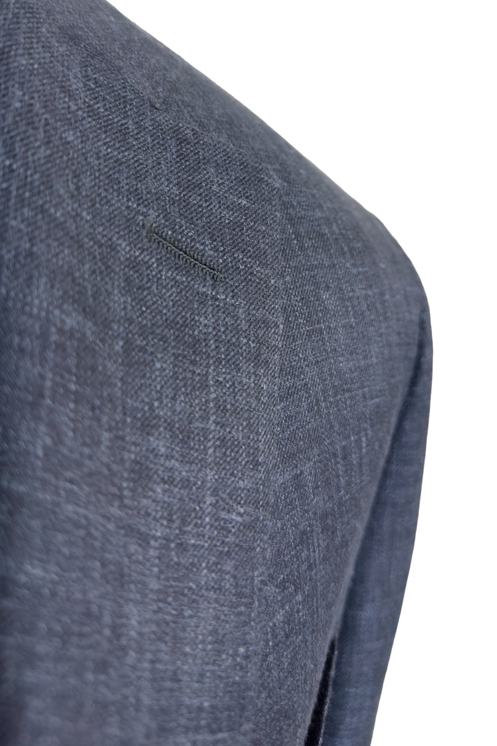 Close-up of a textured gray fabric with a white background