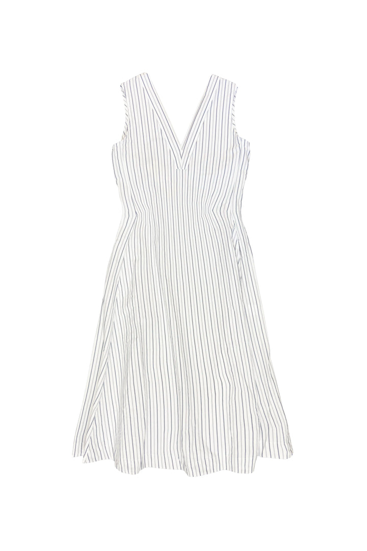 White dress with thin black stripes on a white background