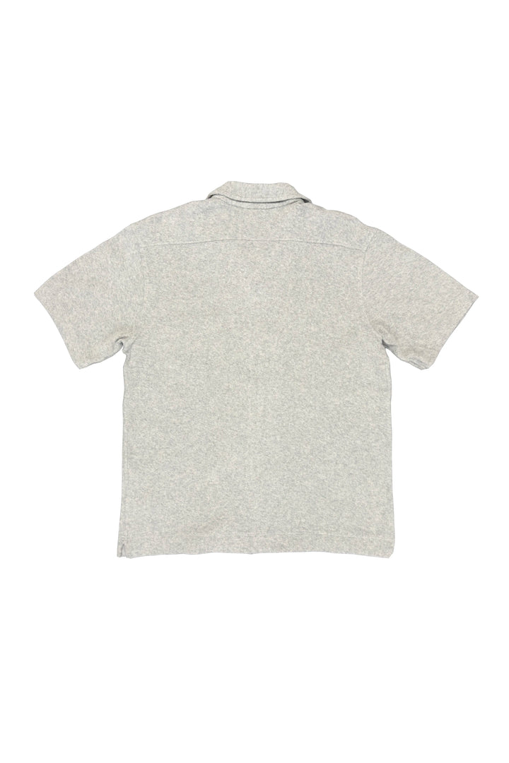 Light gray polo shirt on a white background