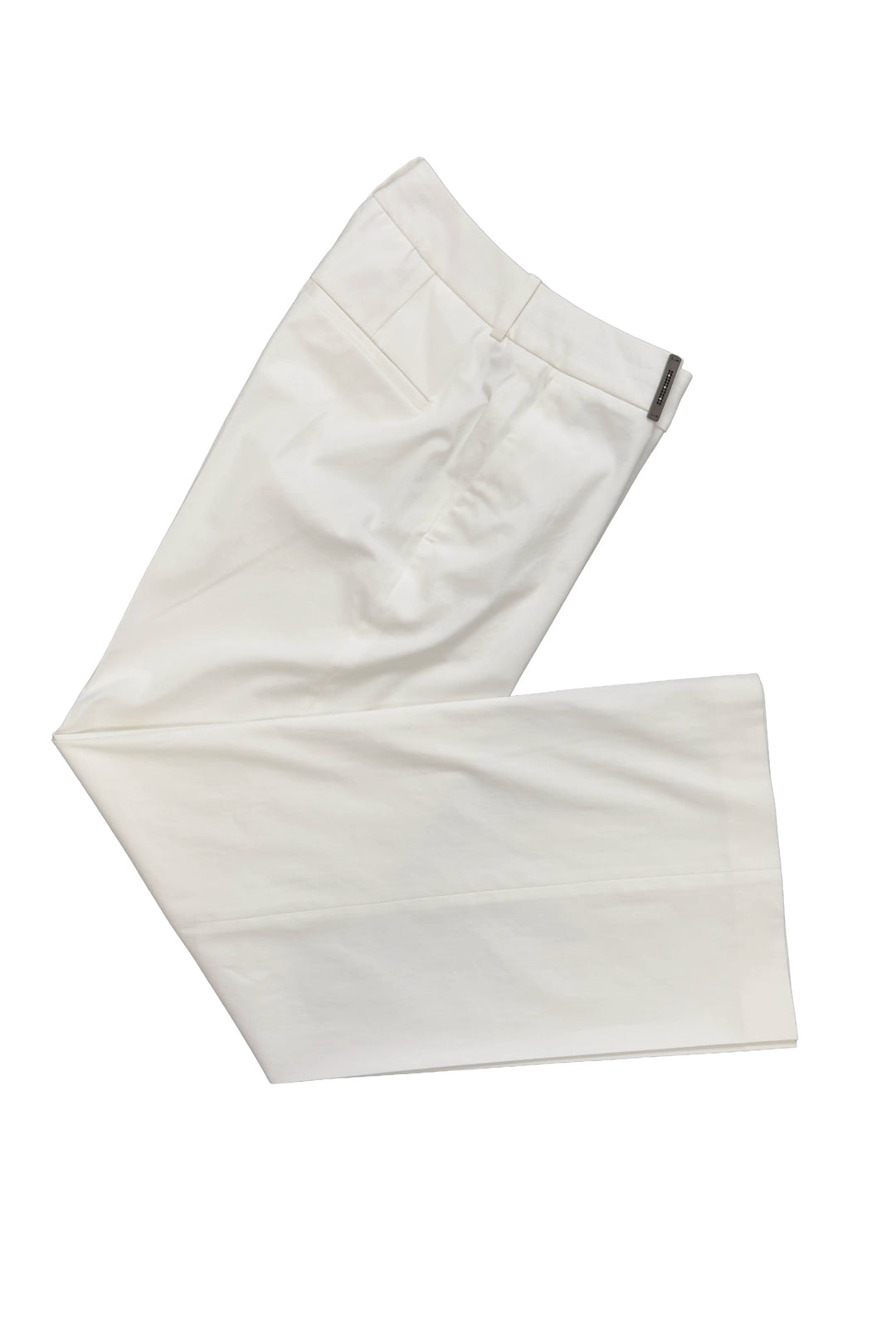 White pants folded on a white background