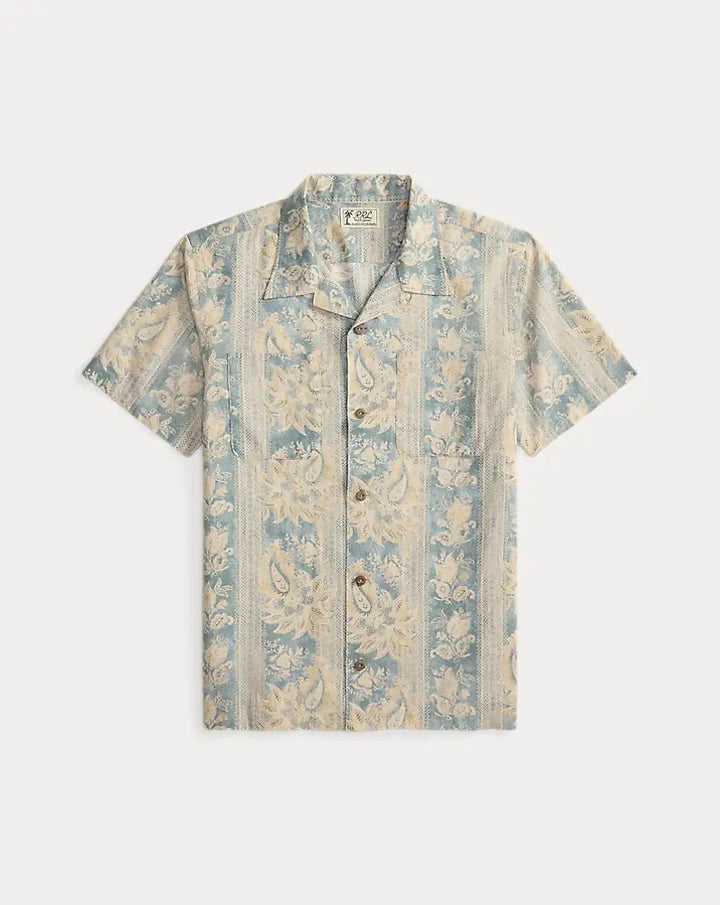 Short-sleeve shirt with floral pattern on a white background
