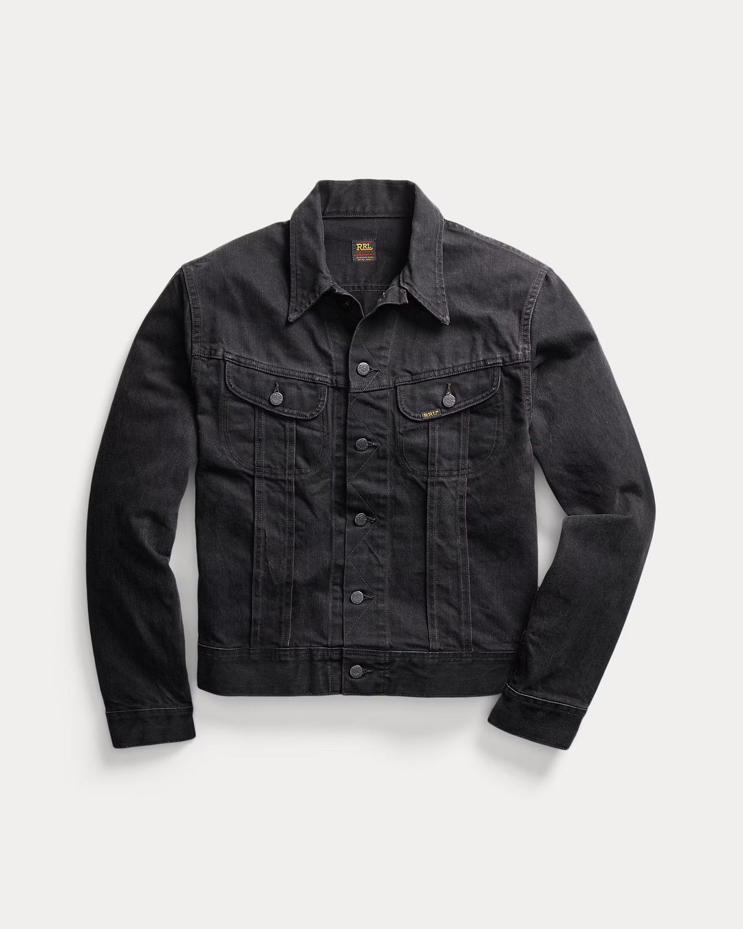Black denim jacket on a light gray background