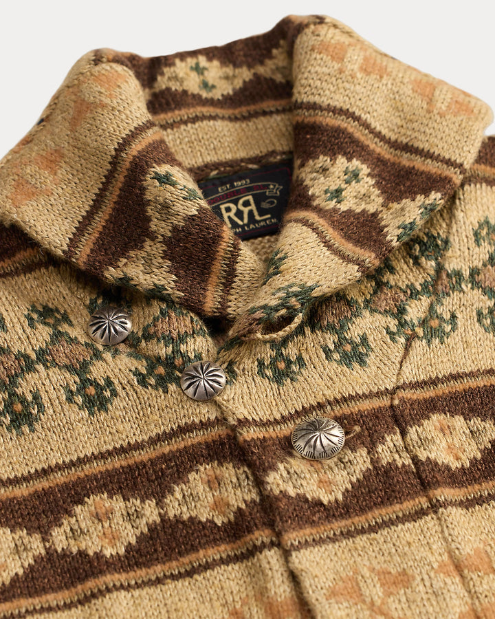 Close-up of a patterned jacket with buttons and a visible brand logo.